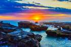 Lava Rock outcroppings in the shallow seas at Cemagi Beach on west coast at Cemagi, Bali, Indonesia Coastal Print